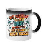Colour changing mug revealing two leaping fish and “We hooked the best Dad! No trout about it! You totally kick bass!”
