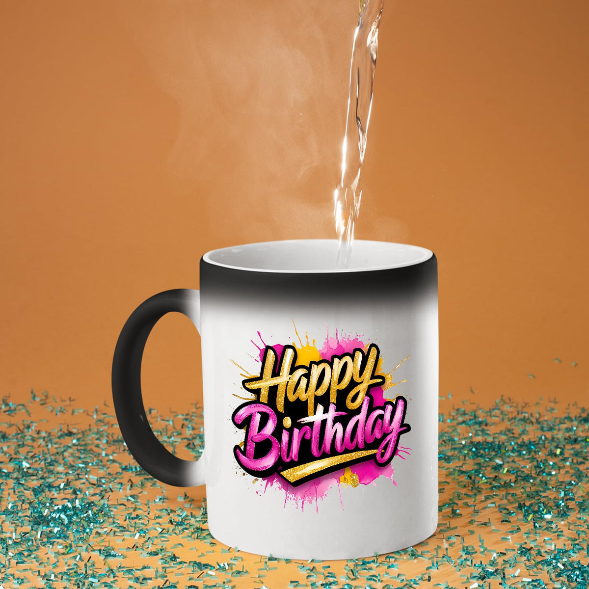 Hot water poured into the Happy Birthday gold and pink colour changing mug as the design appears