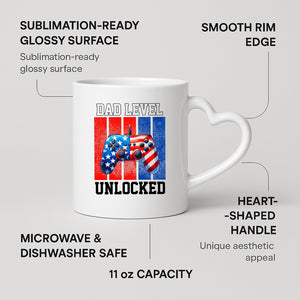 Dad Level Unlocked heart-handle mug on a marble counter with fruit