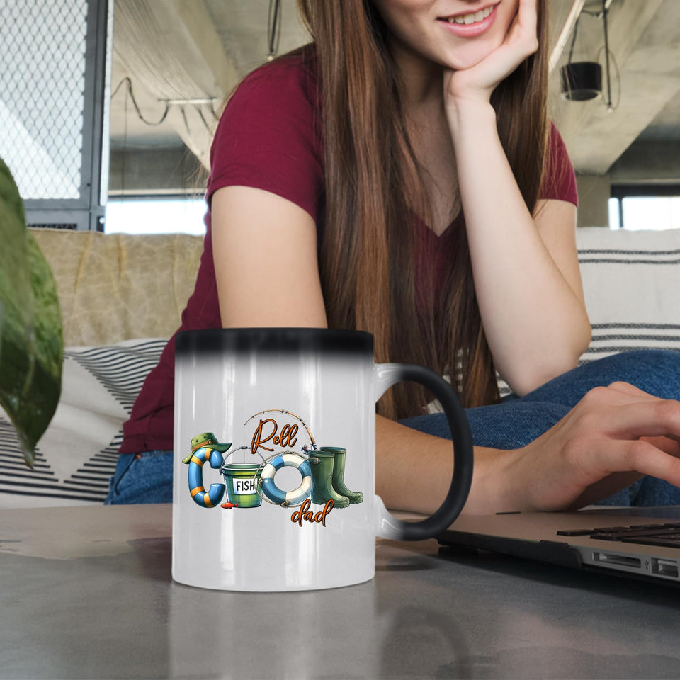 Woman at a laptop with the Reel Cool Dad colour changing mug