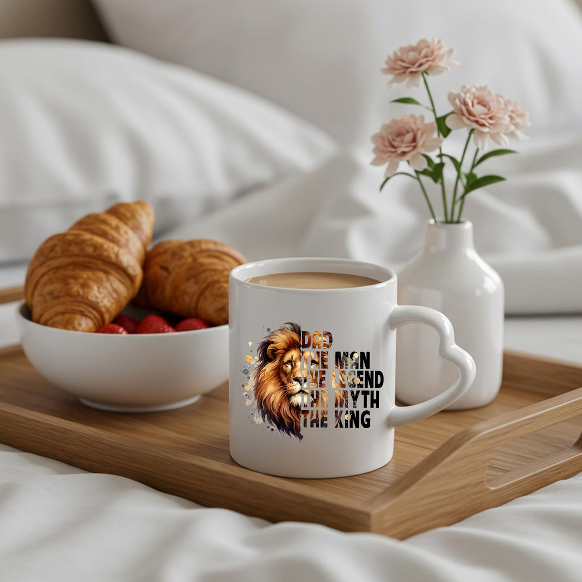 Dad the King lion heart-handle mug on a breakfast tray with croissants and flowers