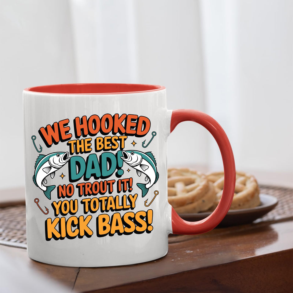 We Hooked the Best Dad mug with a red handle beside biscuits