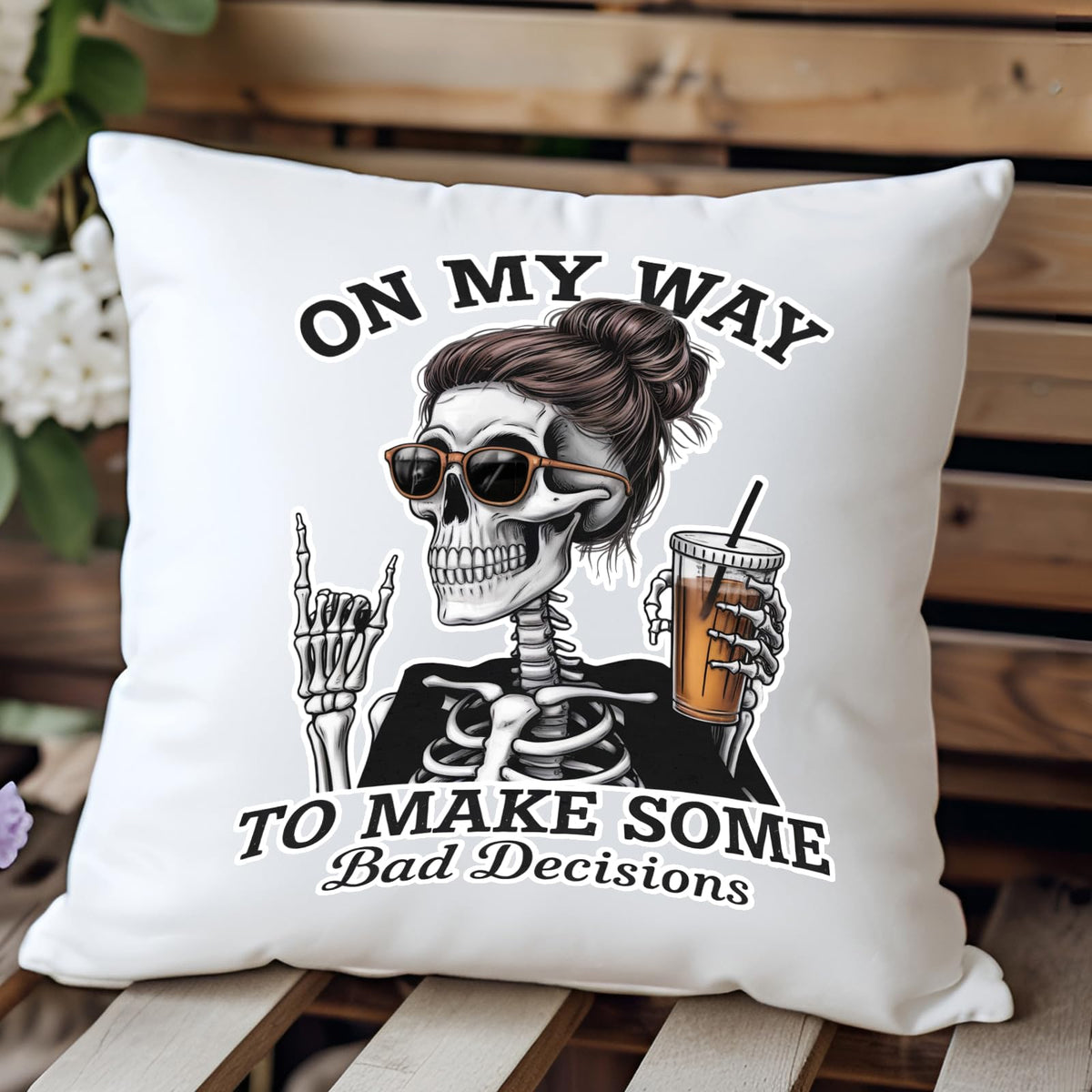 Bad Decisions skeleton cushion on a wooden bench
