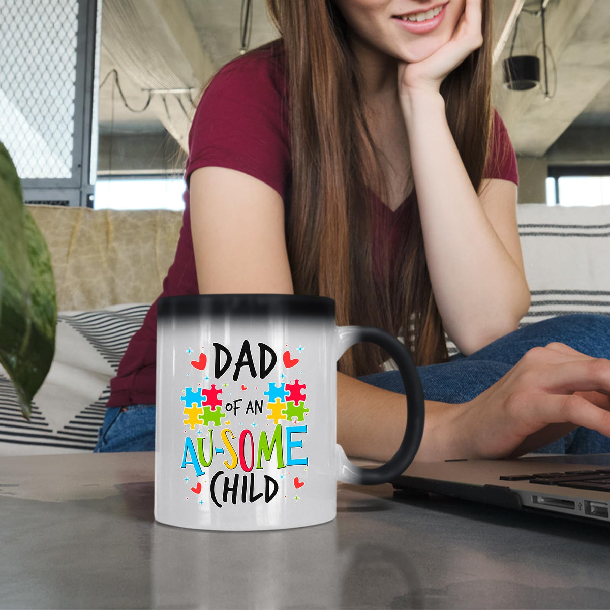 Woman at a laptop with the Dad of an Au-Some Child colour changing mug
