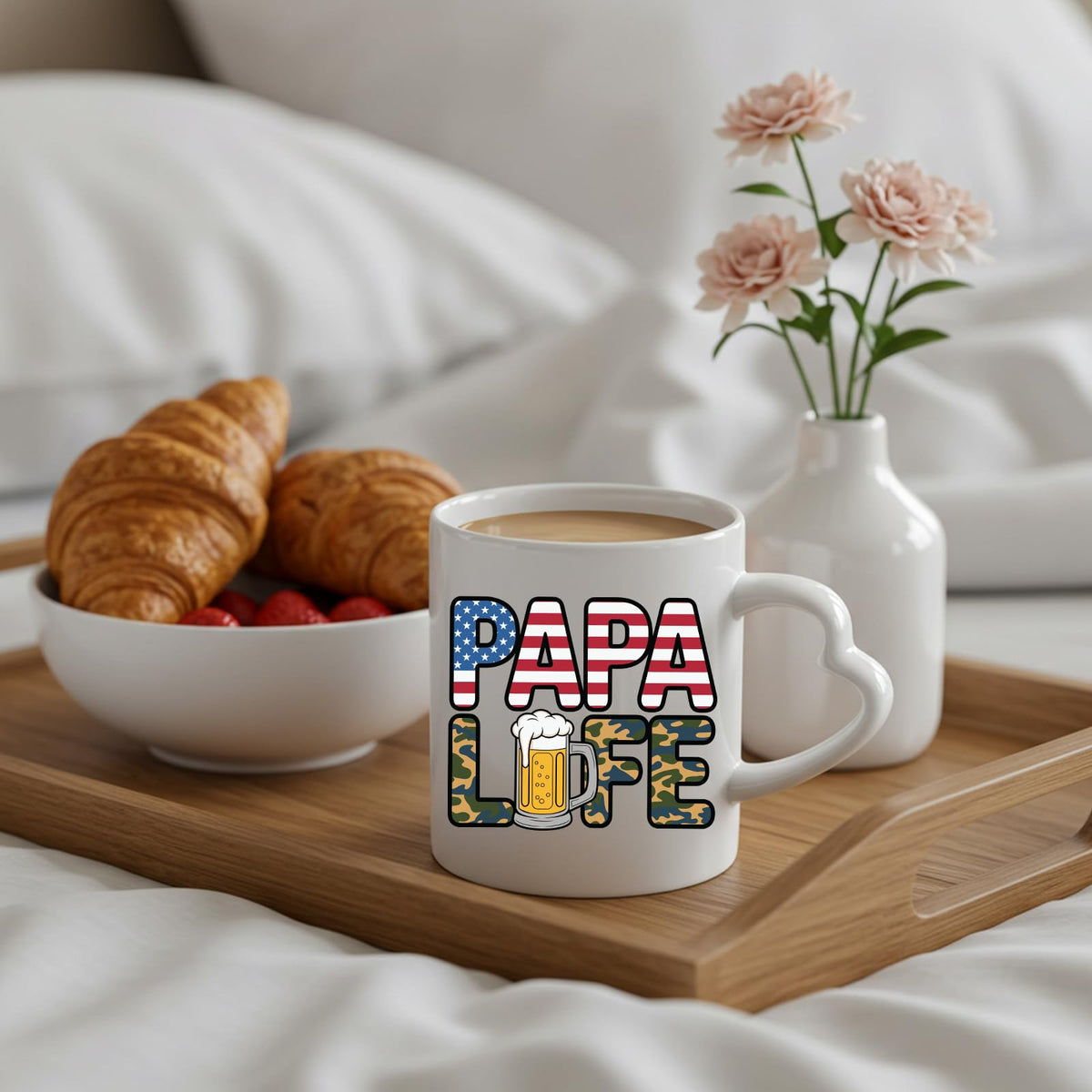 Papa Life heart-handle mug on a breakfast tray with croissants and flowers