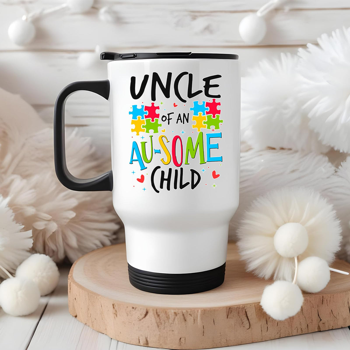 Uncle of an Au-Some Child travel mug on a wooden slice with white pom-poms