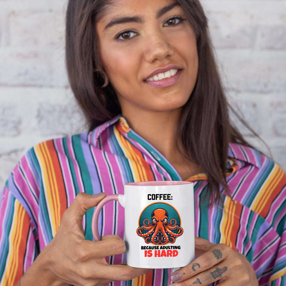 Woman in a striped shirt holding the Adulting Is Hard octopus colour handle mug