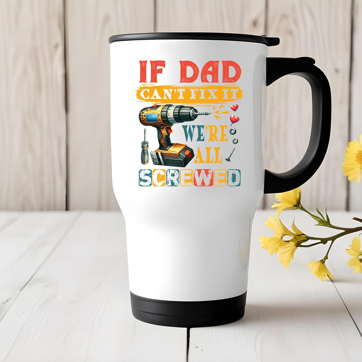 If Dad Can’t Fix It travel mug on a white wooden table with yellow flowers