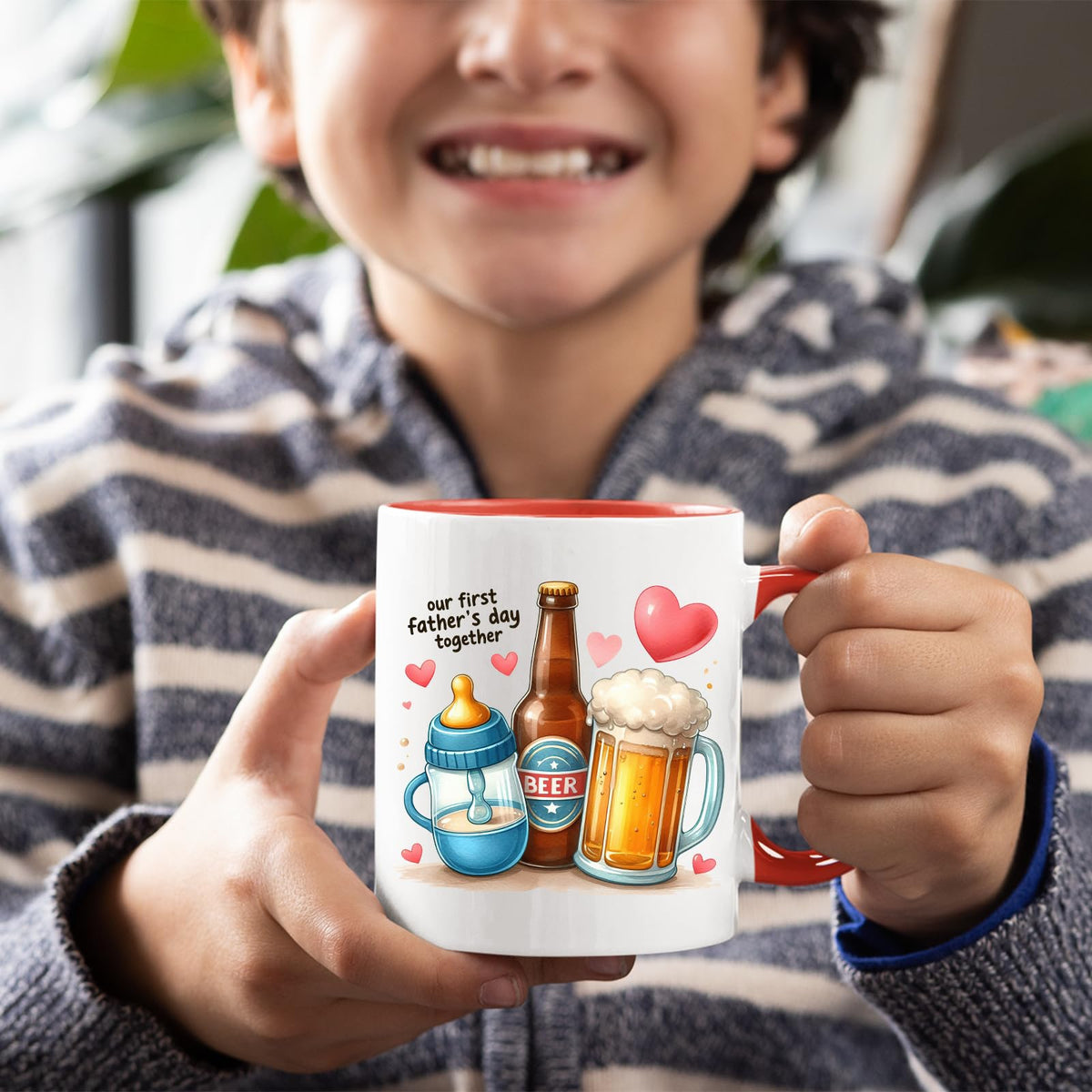 Smiling child holding the First Father’s Day hearts mug with a red handle