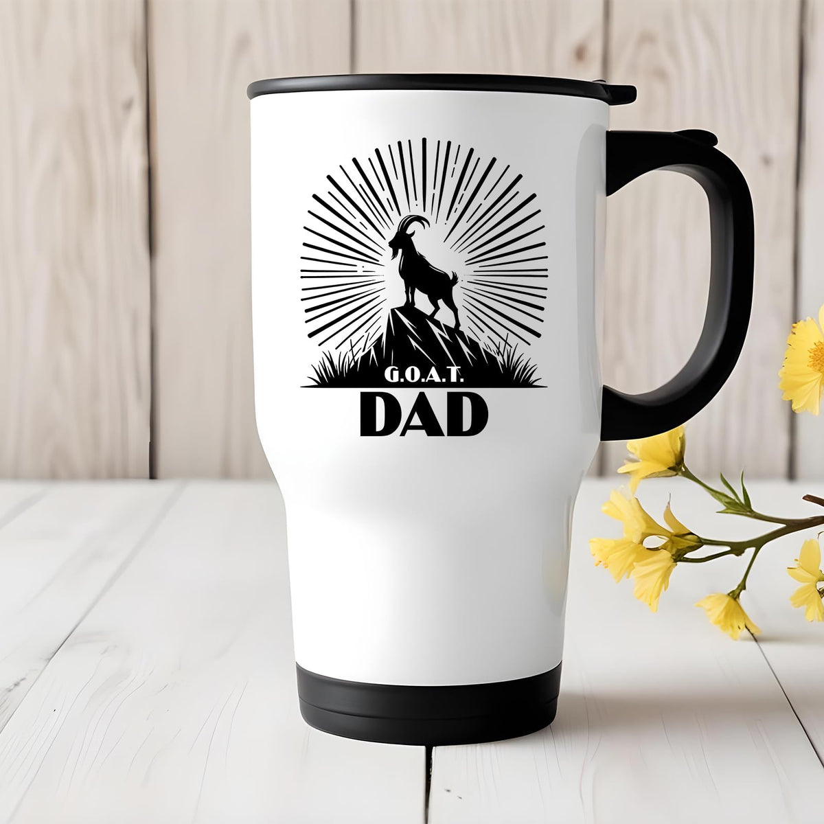 GOAT Dad travel mug on a white wooden table with yellow flowers