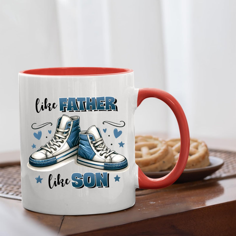 Like Father Like Son mug with a red handle beside biscuits