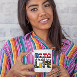 Woman in a striped shirt holding the Papa Life colour handle mug