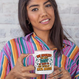 Woman in a striped shirt holding the We Hooked the Best Dad colour handle mug