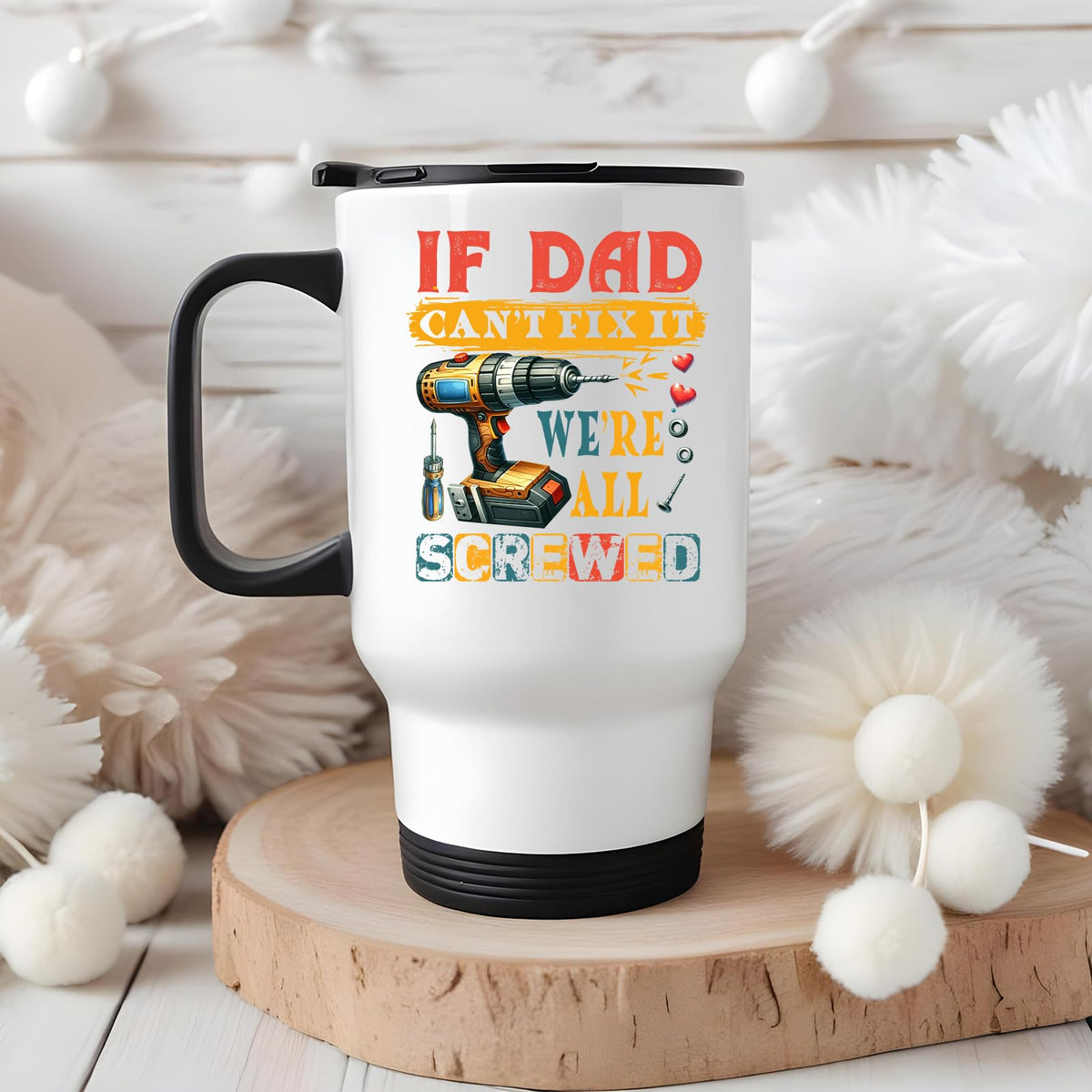 If Dad Can’t Fix It travel mug on a wooden slice with white pom-poms