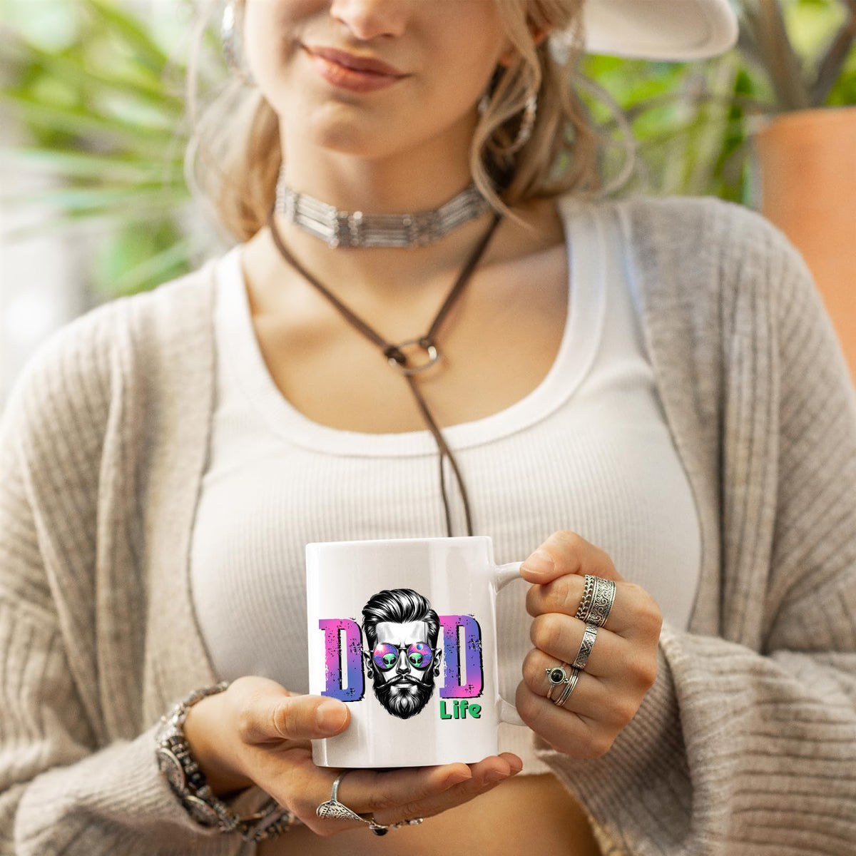Woman in a cardigan holding the Dad Life bearded dad mug