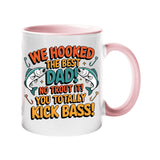 Colour handle mug with two leaping fish and “We hooked the best Dad! No trout about it! You totally kick bass!” – light pink handle and inside