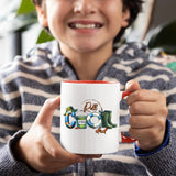 Smiling child holding the Reel Cool Dad mug with a red handle