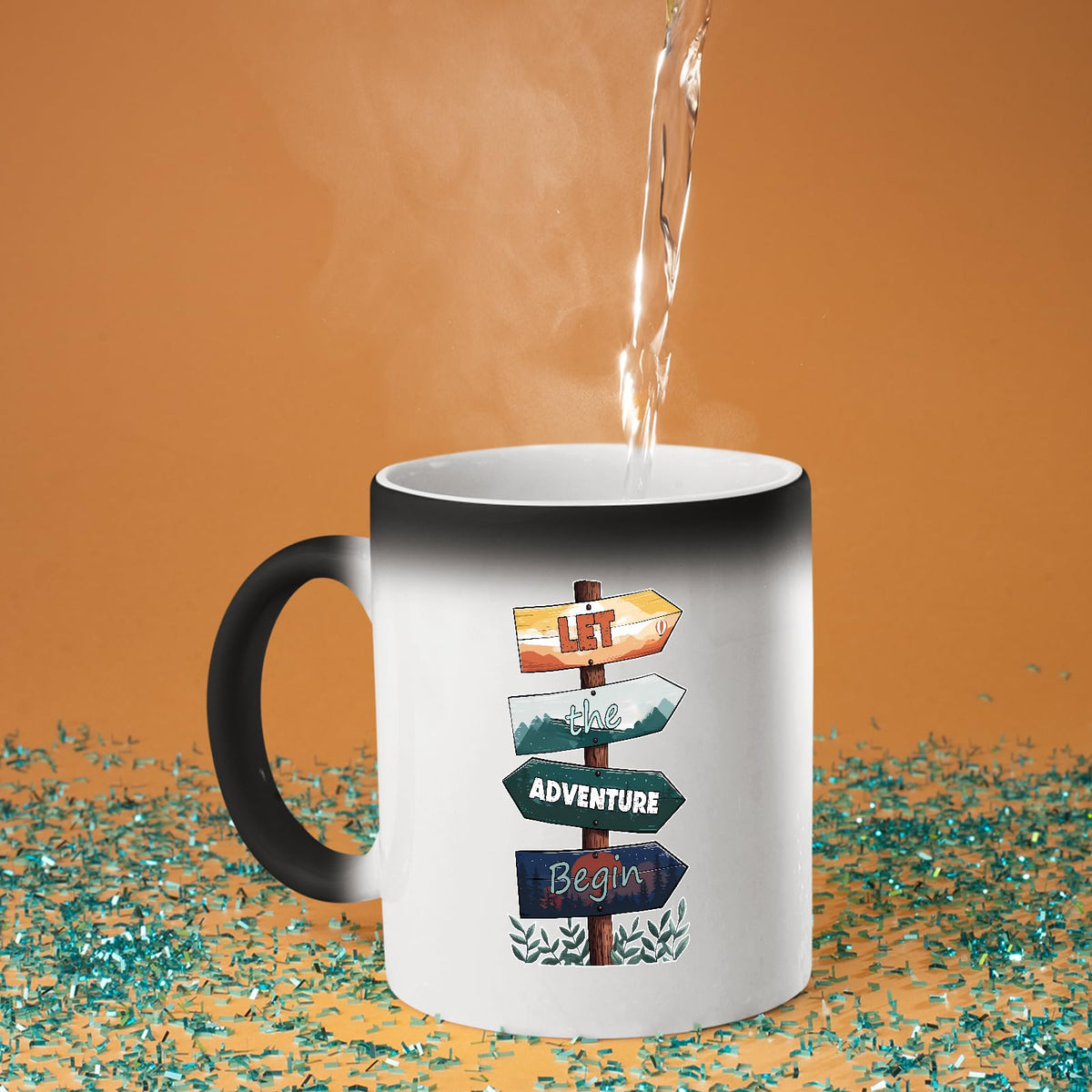Hot water poured into the Let the Adventure Begin colour changing mug as the design appears