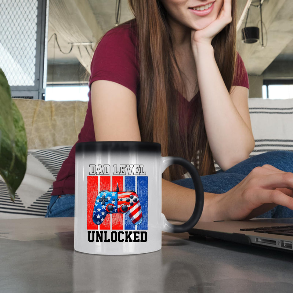 Woman at a laptop with the Dad Level Unlocked colour changing mug