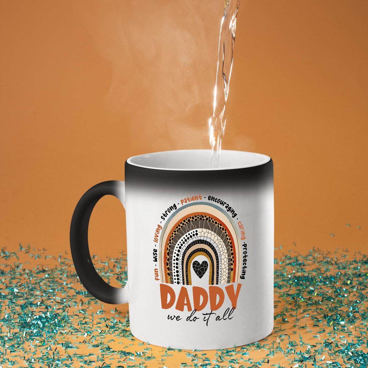 Hot water poured into the Daddy boho rainbow colour changing mug as the design appears