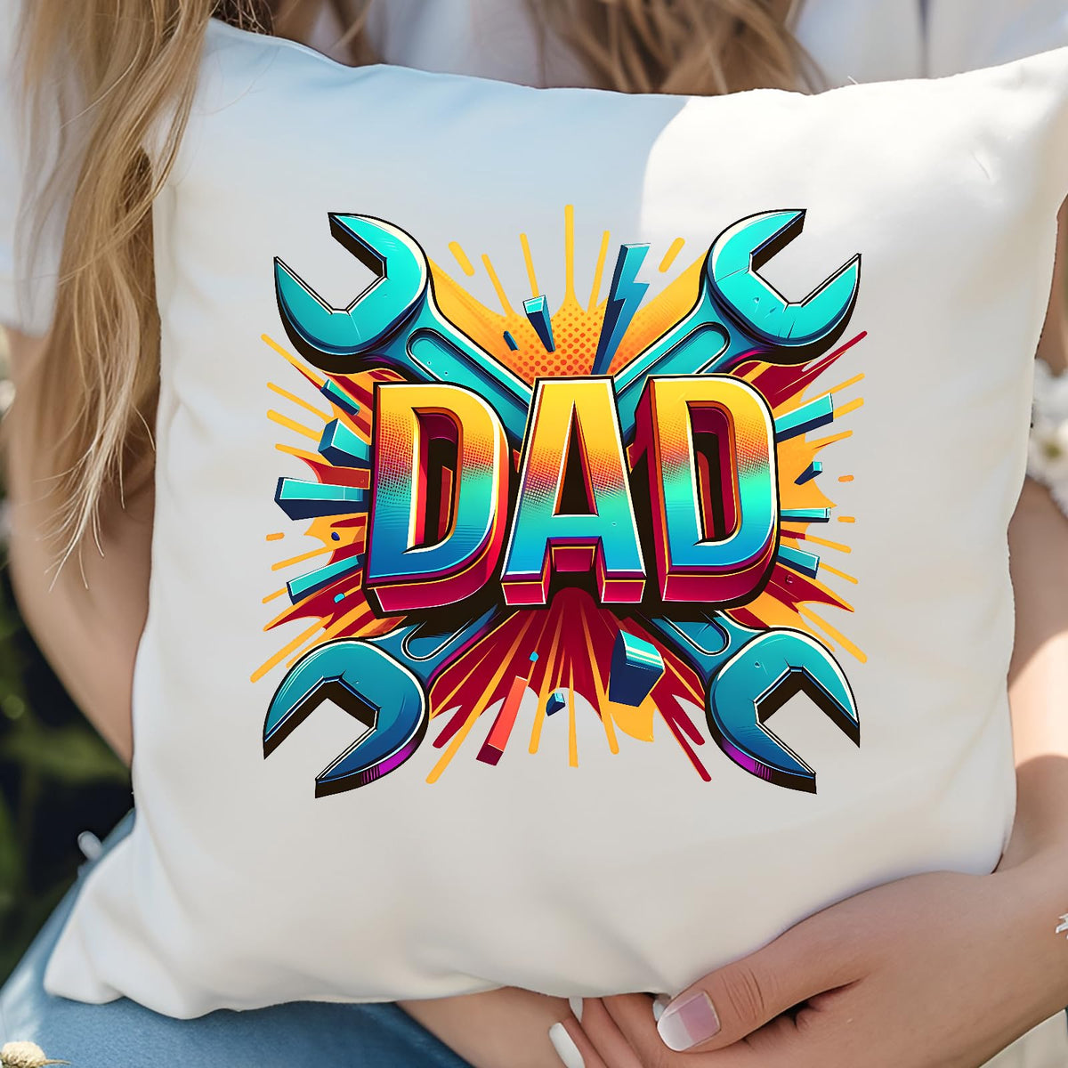 Hands holding the DAD spanners cushion