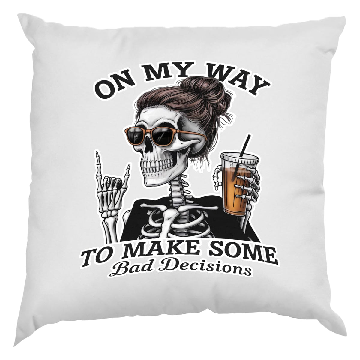 White cushion with a skeleton with sunglasses and iced coffee and “On my way to make some bad decisions”