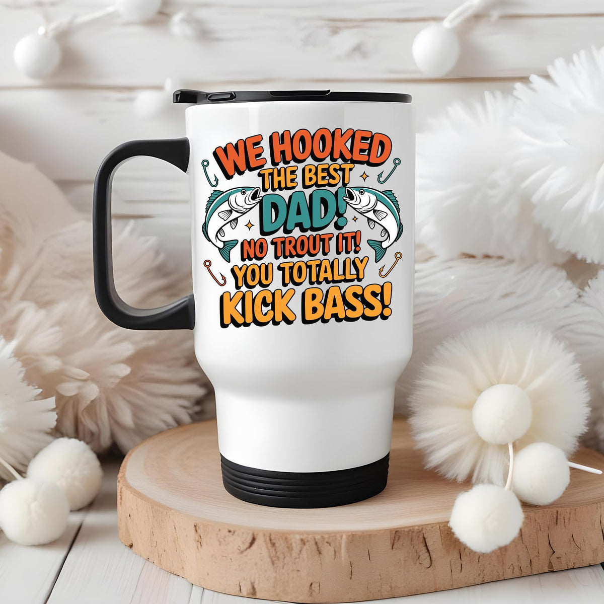 We Hooked the Best Dad travel mug on a wooden slice with white pom-poms