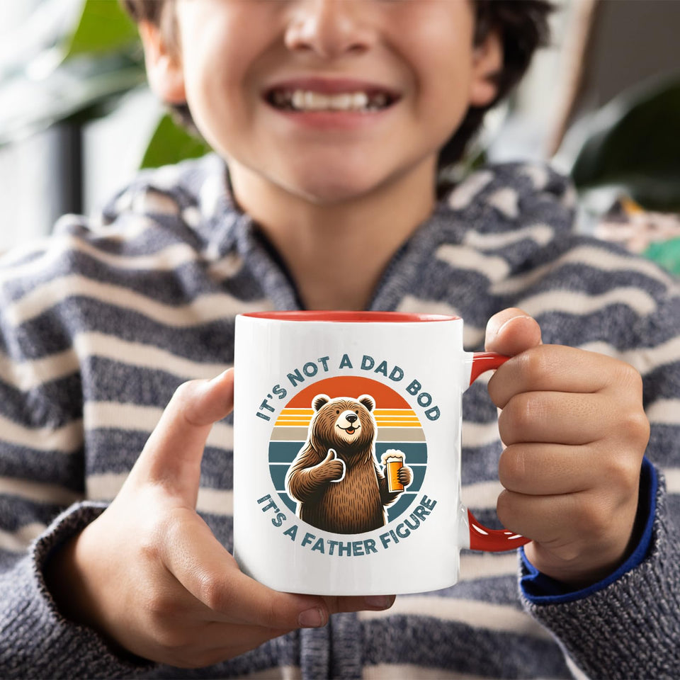 Smiling child holding the Dad Bod bear mug with a red handle