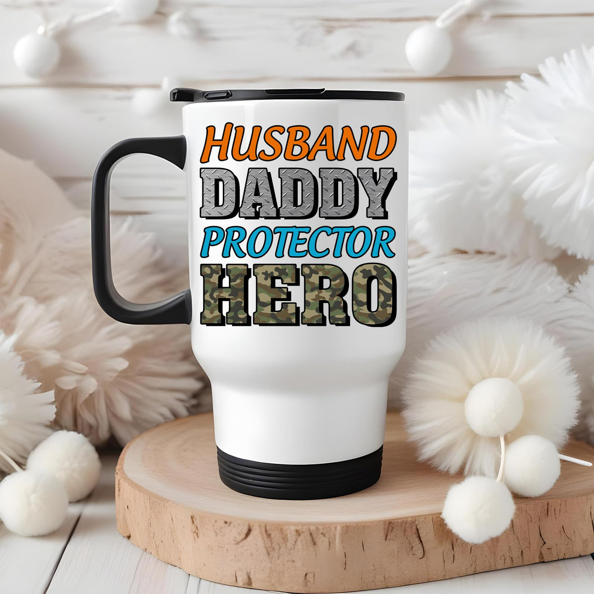 Husband Daddy Protector Hero camo travel mug on a wooden slice with white pom-poms