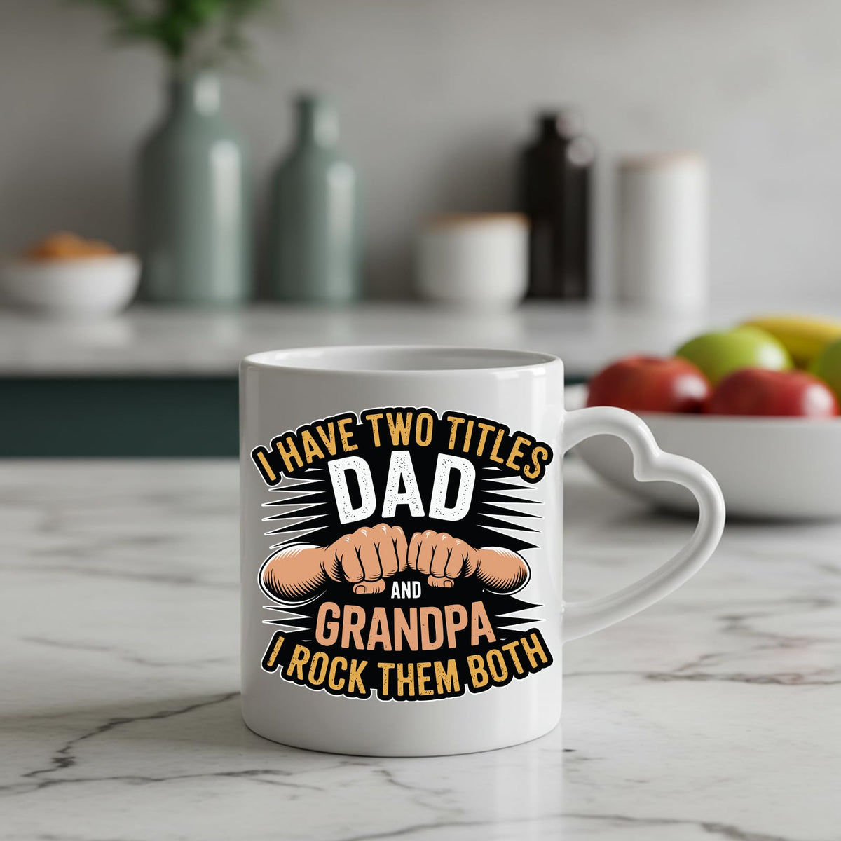 Two Titles Dad and Grandpa heart-handle mug on a marble counter with fruit