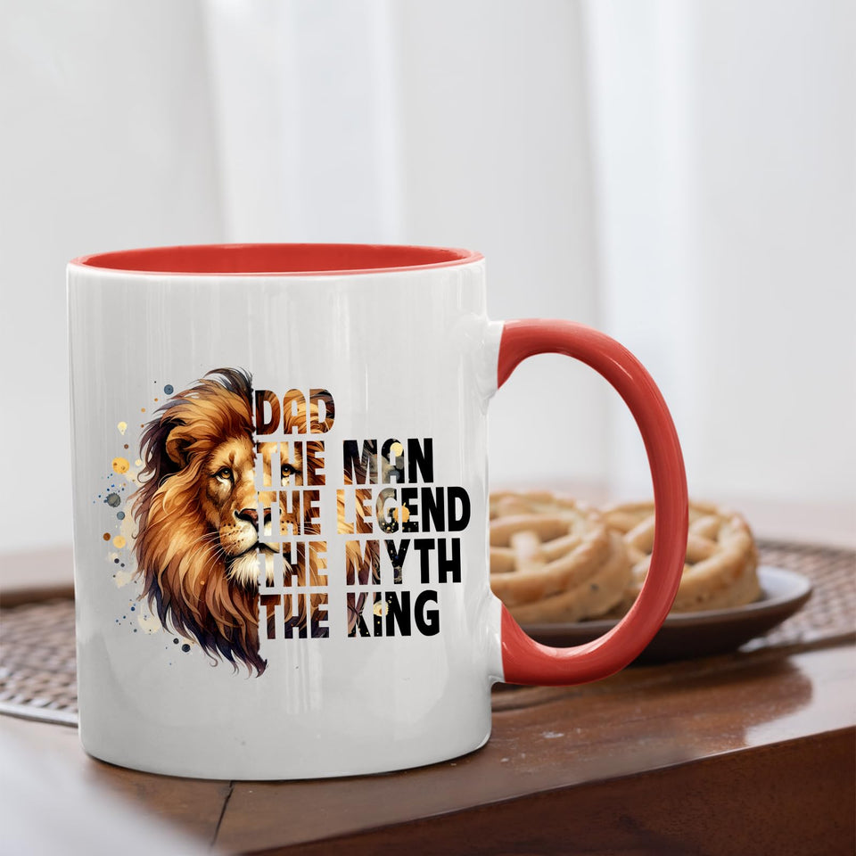 Dad the King lion mug with a red handle beside biscuits