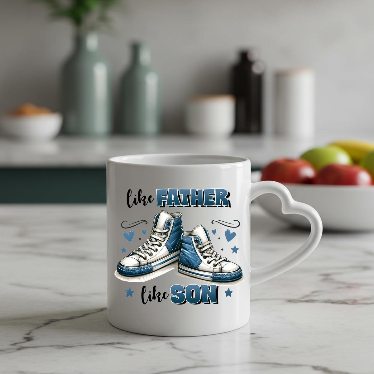 Like Father Like Son heart-handle mug on a marble counter with fruit