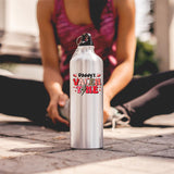 Daddy’s Valentine water bottle on the ground as a woman stretches