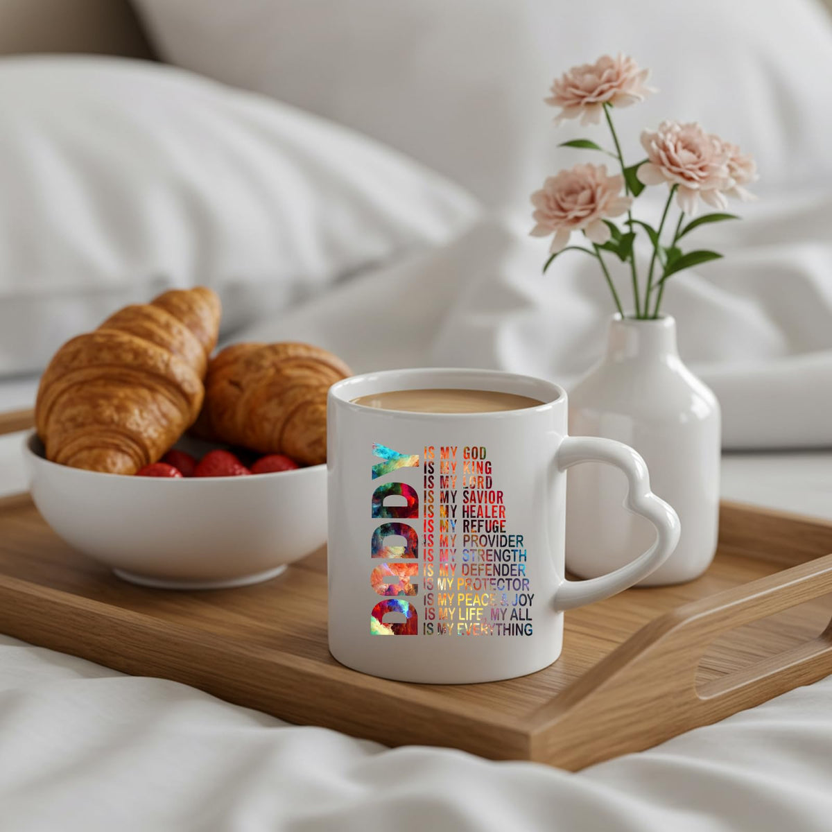 Daddy Is My God heart-handle mug on a breakfast tray with croissants and flowers