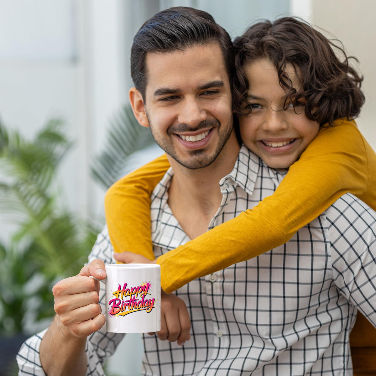 Father and son with the Happy Birthday mug