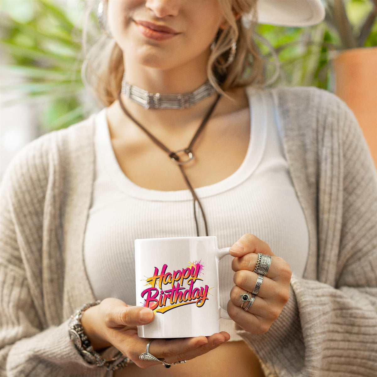 Woman holding the Happy Birthday mug