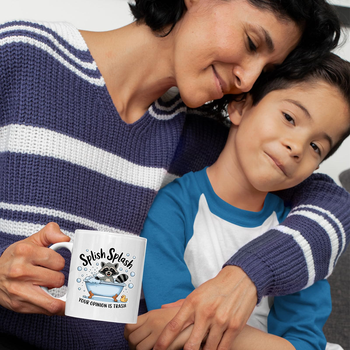 Mum and son with the Splish Splash raccoon mug