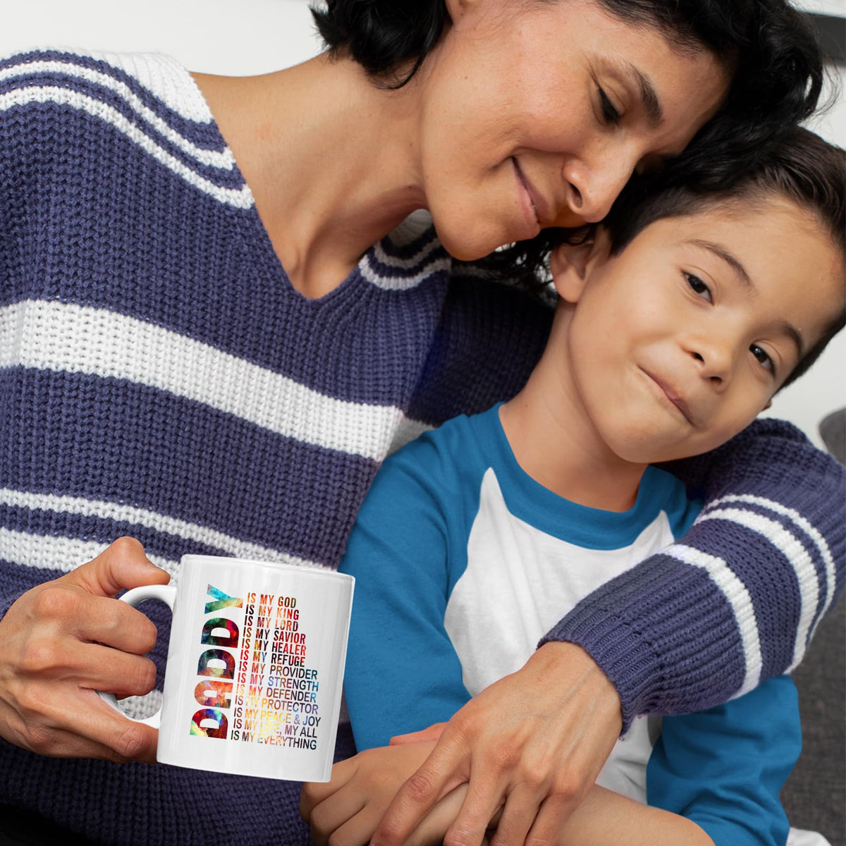 Mum and son with the Daddy Is My God mug