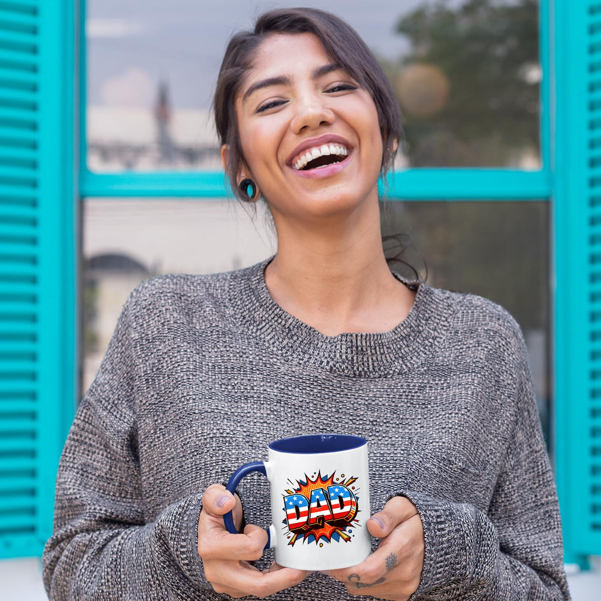 Laughing woman holding the Stars and Stripes DAD mug with a dark blue handle