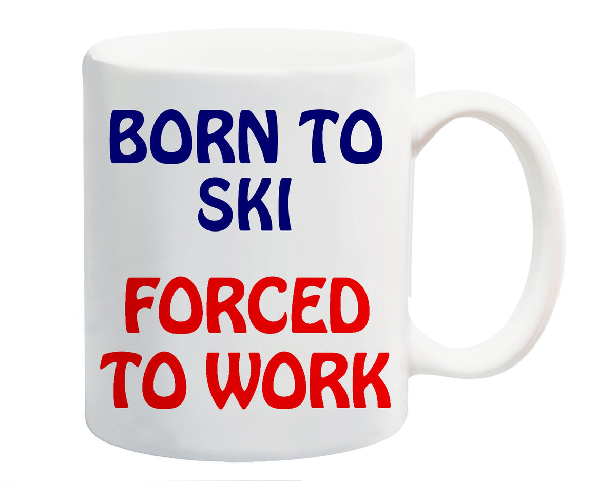 White ceramic mug printed with “Born to Ski” in navy and “Forced to Work” in red