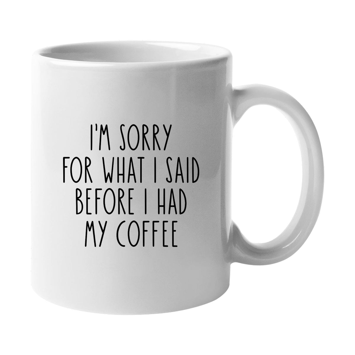 White mug with “I'm sorry for what I said before I had my coffee” in simple black lettering