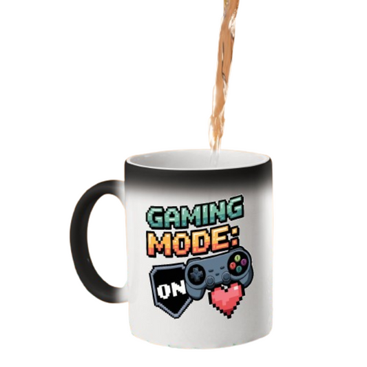 Hot drink poured into the colour changing mug as “Gaming Mode: On” with a game controller and pixel heart appears
