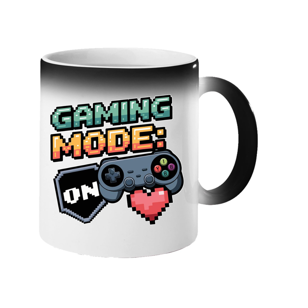 Colour changing mug revealing “Gaming Mode: On” with a game controller and pixel heart