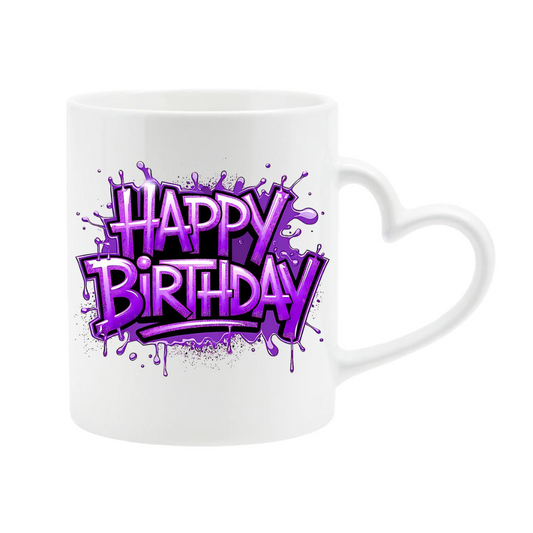 White heart-handle mug with purple graffiti “Happy Birthday” lettering