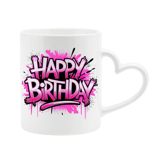White heart-handle mug with pink graffiti “Happy Birthday” lettering