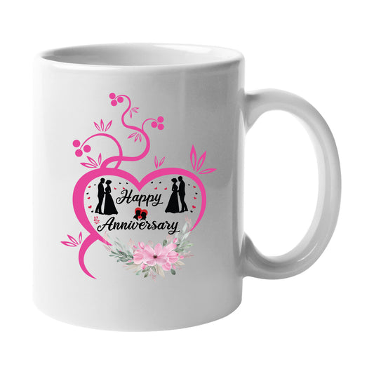 White mug with a pink floral heart with a couple's silhouette and “Happy Anniversary”