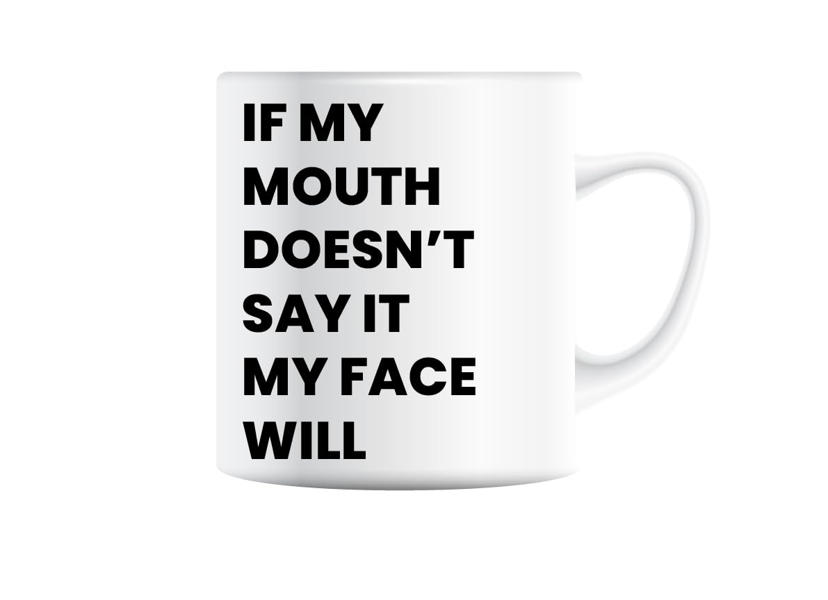 White mug printed with “If My Mouth Doesn't Say It, My Face Will” in bold black capitals
