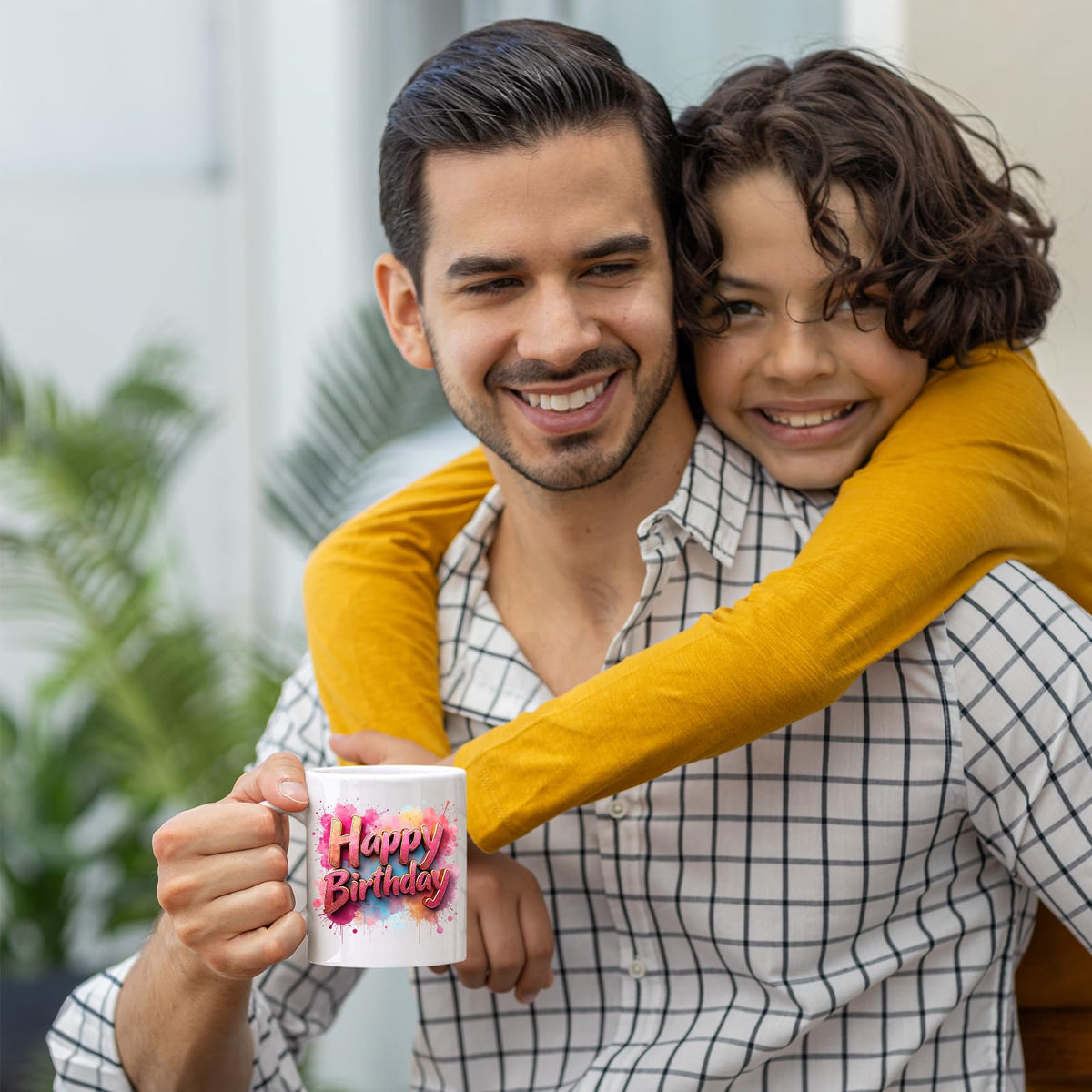 Father and son with the Happy Birthday mug