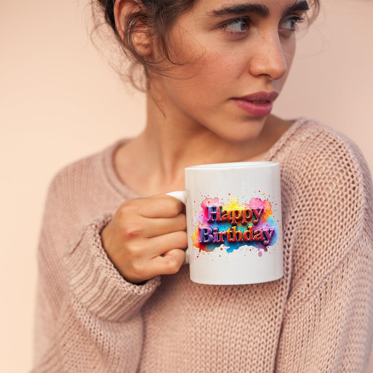 Woman sipping from the Happy Birthday mug